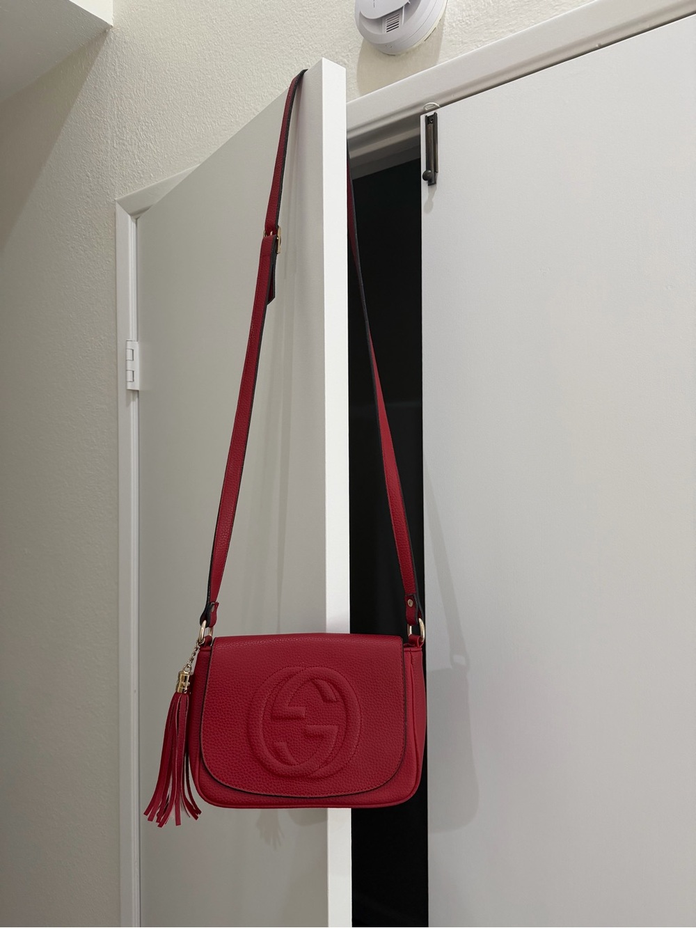 Red soho crossbody bag